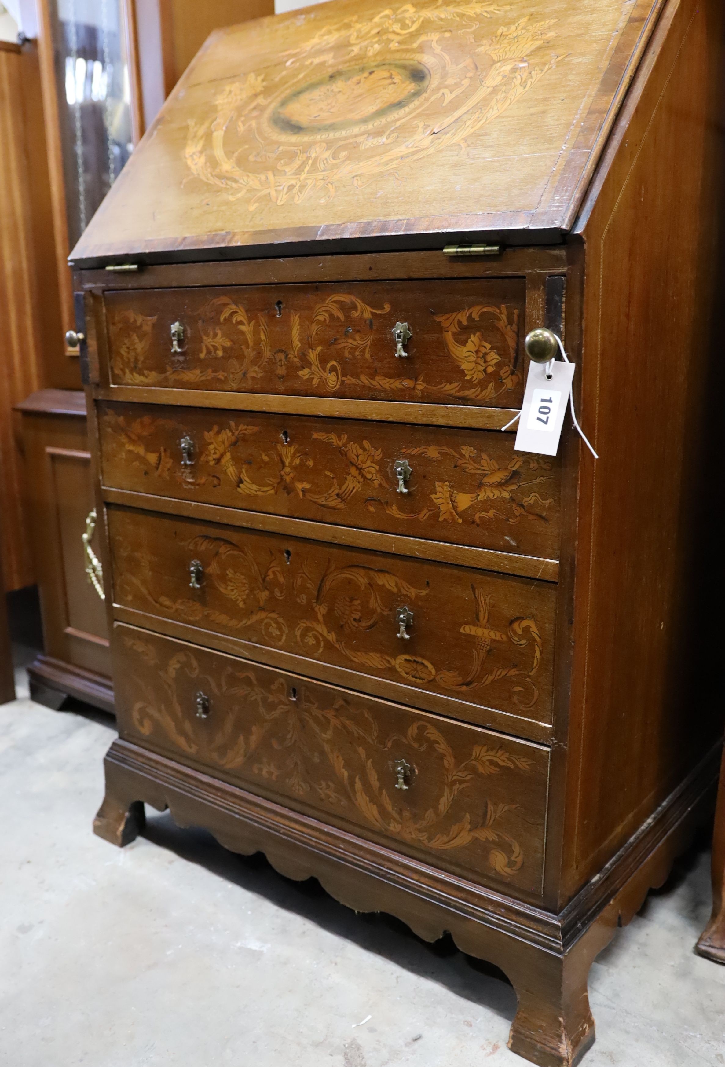 An Edwardian marquetry inlaid mahogany bureau, width 61cm, depth 46cm, height 99cm